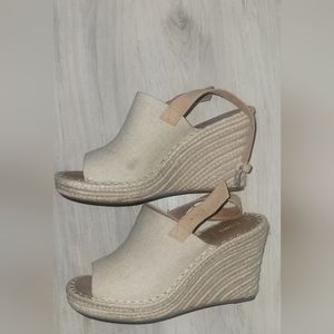 Size 7.5 womens Toms heels